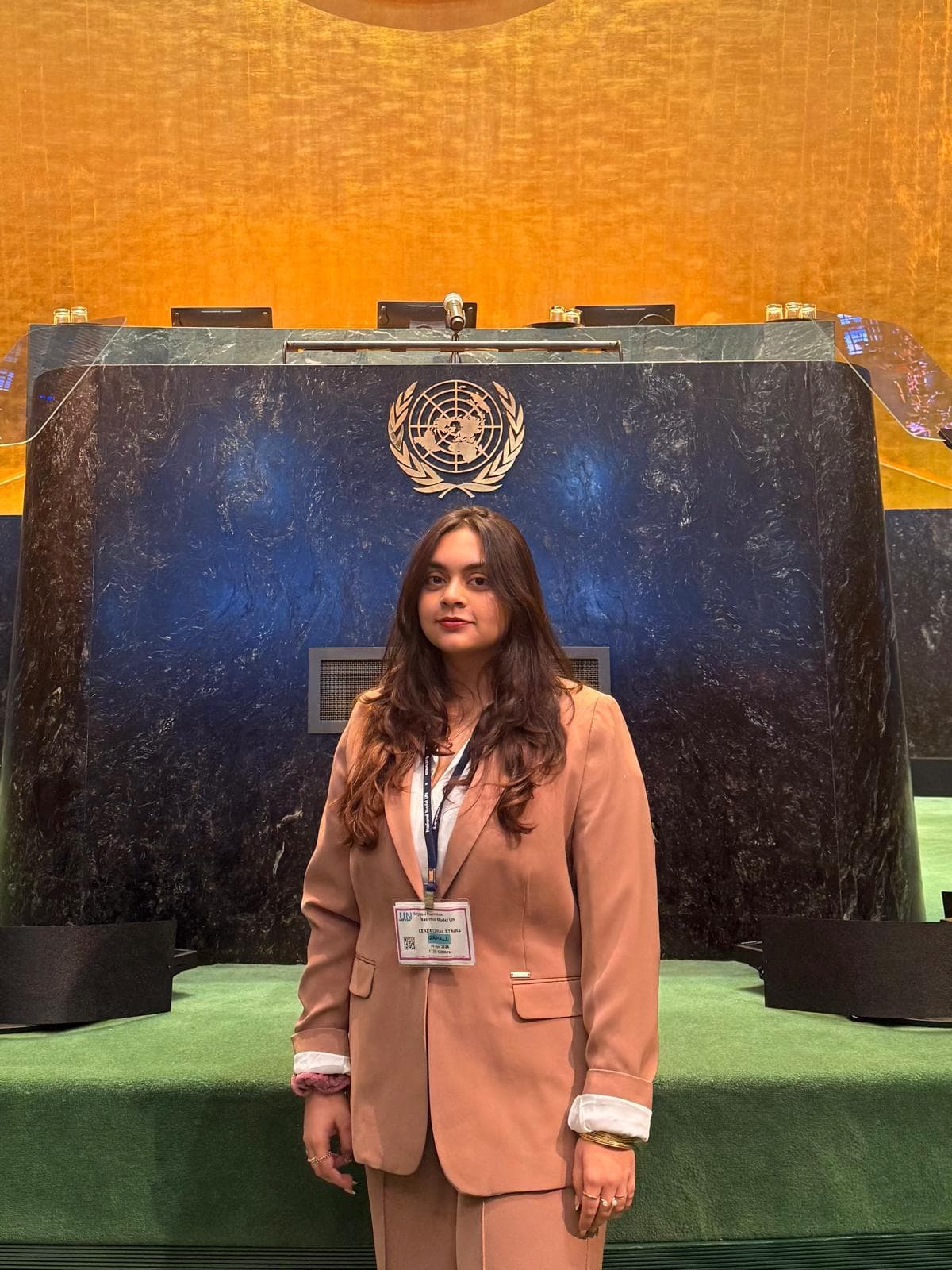 Nayonikaa Singhaal, Secretary-General of Yashmay-Alma GMUN India 2026, at the United Nations General Assembly podium